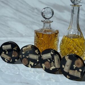 Handmade Resin Black and Gold Coasters Set of 4. Featuring high end cork accents